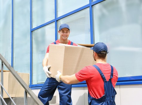 Removal team handling house move preparations in Purley