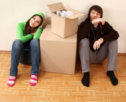 Local removal team handling boxes and furniture in Purley