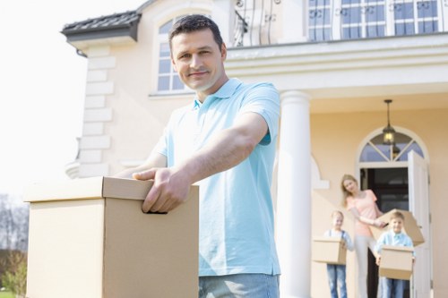 Professional flat removals planning in Purley with moving boxes