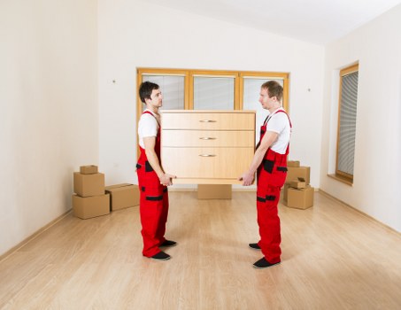 Staff member checking a storage area for safety hazards