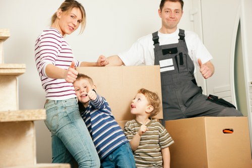 Team providing packing services in Purley for a home relocation